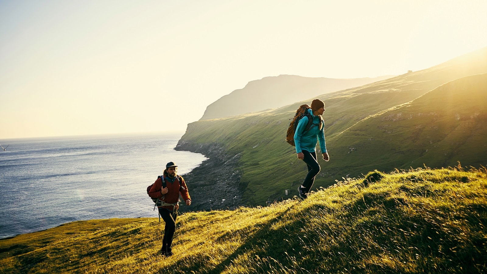 Hiking on hill grass 1600x900